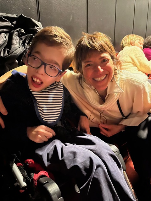 Andrea with her son Eric during a communication session